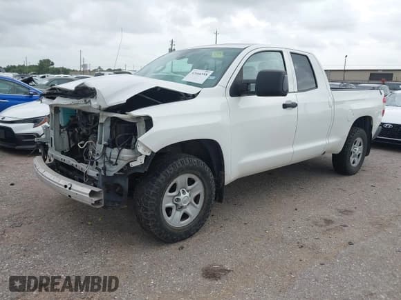 ✅ 2019 Toyota Tundra SR • VIN: 5TFRM5F1XKX142293 • Лот: 42666588. Опубликован ранее на IAAI с пробегом 198 159 миль. Бесплатный доступ к архиву аукционных продаж из США и подробный отчёт об истории автомобиля на DreamBid. Изображение 2.