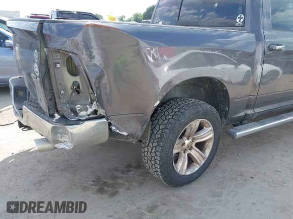 2014 Ram 1500 Big Horn with VIN 1C6RR7LM6ES398855, listed as a IAAI auction lot 42418978 with 180,591 mi miles and . Bid and sale history available at DreamBid. Image 6.