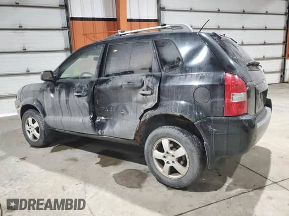 2006 Hyundai Tucson GL z VIN KM8JM12B96U289857, wystawiony jako Copart lot #83230864 z przebiegiem 222 817 mil mil oraz Szkoda całkowita • Salvage title. Historia ofert i sprzedaży dostępna na DreamBid. Obrazek 2.