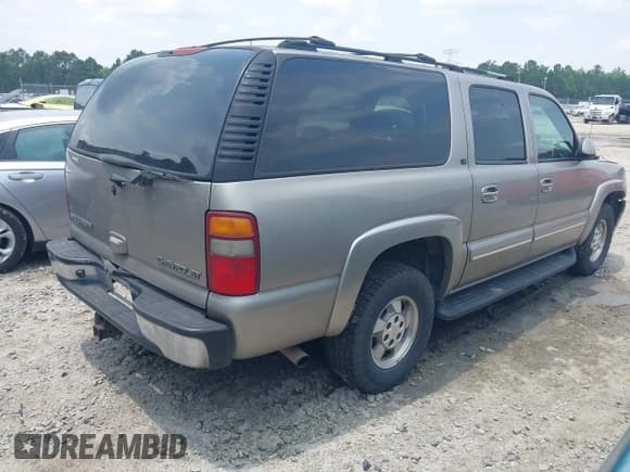 ✅ 2003 Chevrolet Suburban LT • VIN: 1GNFK16Z13J199808 • Lot: 42404012. Listed on IAAI with 242,232 mi. Free auction sales archive from the USA and detailed vehicle history report at DreamBid. Image 4.