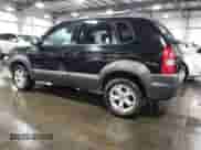 2009 Hyundai Tucson SE with VIN KM8JN12D79U114445, listed as a Copart auction lot 76508704 with 162,112 mi miles and Salvage title. Bid and sale history available at DreamBid. Image 2.