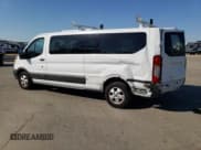 ✅ 2018 Ford Transit Passenger XL • VIN: 1FBZX2YG9JKA72955 • Lot: 59350194. Listed on Copart with 151,401 mi. Free auction sales archive from the USA and detailed vehicle history report at DreamBid. Image 2.