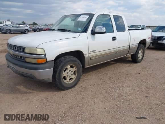2002 Chevrolet Silverado 1500 LS with VIN 2GCEK19T521378079, listed as a IAAI auction lot 43242169 with 264,320 mi miles and . Bid and sale history available at DreamBid. Image 2.