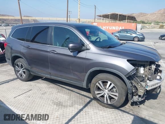 ✅ 2018 Honda Pilot EX-L • VIN: 5FNYF6H57JB044438 • Lot: 42996544. Listed on IAAI with 86,612 mi. Free auction sales archive from the USA and detailed vehicle history report at DreamBid. Image 14.