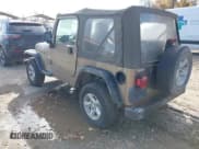 ✅ 2003 Jeep Wrangler X • VIN: 1J4FA39S63P307028 • Lot: 43632015. Listed on IAAI with 129,241 mi. Free auction sales archive from the USA and detailed vehicle history report at DreamBid. Image 3.