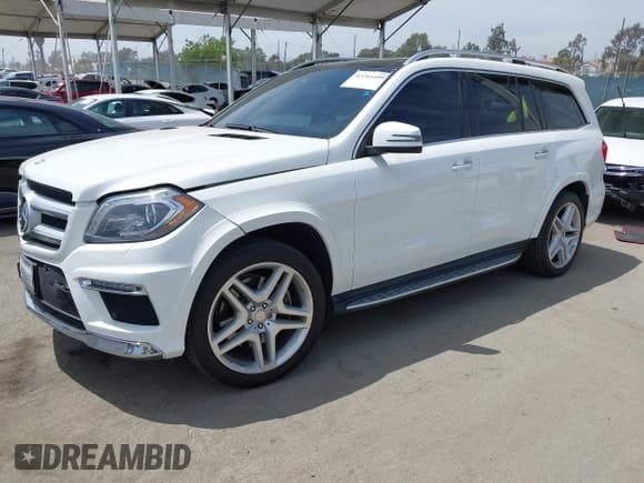 ✅ 2015 Mercedes-Benz GL 550 • VIN: 4JGDF7DE4FA479407 • Лот: 42261499. Опубликован ранее на IAAI с пробегом 93 462 миль. Бесплатный доступ к архиву аукционных продаж из США и подробный отчёт об истории автомобиля на DreamBid. Изображение 2.