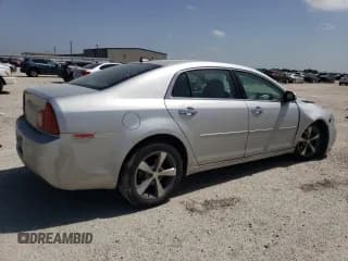 ✅ 2012 Chevrolet Malibu 1LT • VIN: 1G1ZC5E05CF371704 • Lot: 65844584. Listed on Copart with 102,859 mi. Free auction sales archive from the USA and detailed vehicle history report at DreamBid. Image 3.