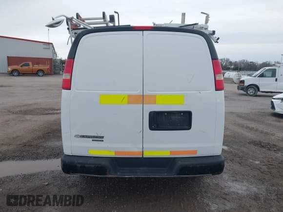 ✅ 2013 Chevrolet Express Cargo • VIN: 1GCWGFCAXD1140635 • Lot: 43410975. Listed on IAAI with 185,343 mi. Free auction sales archive from the USA and detailed vehicle history report at DreamBid. Image 16.