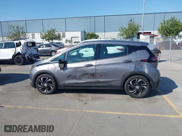 ✅ 2023 Chevrolet Bolt EV 2LT • VIN: 1G1FX6S01P4207434 • Lot: 42749790. Listed on IAAI with 9,641 mi. Free auction sales archive from the USA and detailed vehicle history report at DreamBid. Image 14.