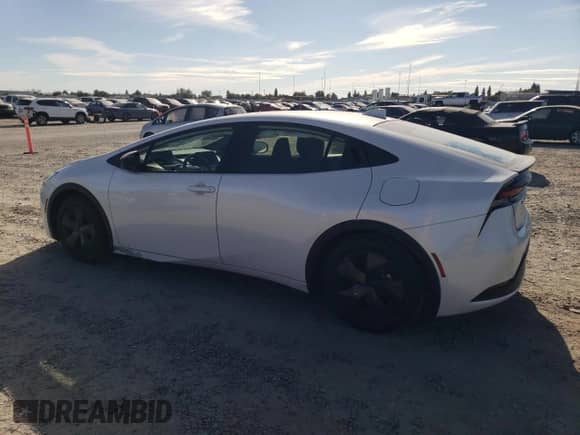 2025 Toyota Prius LE with VIN JTDACAAUXS3063658, listed as a Copart auction lot 71305795 with 2,278 mi miles and Salvage title. Bid and sale history available at DreamBid. Image 2.