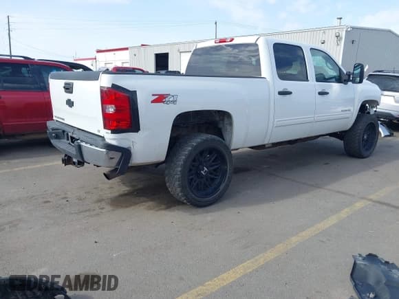 ✅ 2013 Chevrolet Silverado 2500HD LT • VIN: 1GC1KXCG2DF139002 • Lot: 41979888. Listed on IAAI with 198,634 mi. Free auction sales archive from the USA and detailed vehicle history report at DreamBid. Image 4.