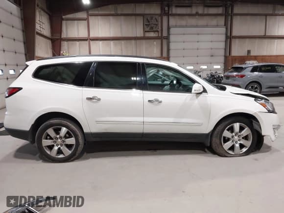 ✅ 2015 Chevrolet Traverse LTZ • VIN: 1GNKVJKD1FJ318459 • Lot: 43526921. Wystawiony na IAAI z przebiegiem 198 644 mil. Bezpłatny archiwum sprzedaży aukcyjnych z USA i szczegółowy raport historii pojazdu na DreamBid. Zdjęcie 14.