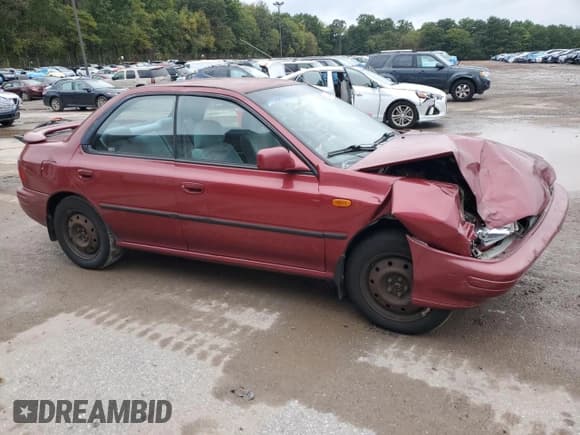 ✅ 1996 Subaru Impreza • VIN: JF1GC4557TH512593 • Lot: 74099464. Listed on Copart with 112,437 mi. Free auction sales archive from the USA and detailed vehicle history report at DreamBid. Image 4.