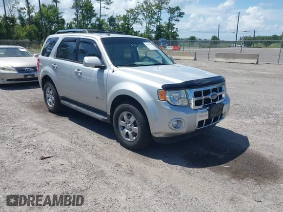 ✅ 2009 Ford Escape Hybrid • VIN: 1FMCU593X9KA59775 • Lot: 42763464. Listed on IAAI with 142,396 mi. Free auction sales archive from the USA and detailed vehicle history report at DreamBid. Image 1.