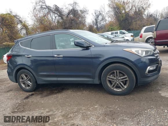 ✅ 2017 Hyundai Santa Fe 2.4L • VIN: 5NMZUDLBXHH034863 • Lot: 43744417. Listed on IAAI with 120,739 mi. Free auction sales archive from the USA and detailed vehicle history report at DreamBid. Image 13.