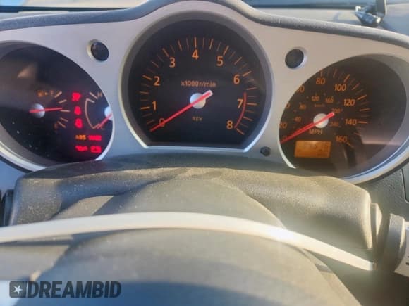 ✅ 2005 Nissan 350Z • VIN: JN1AZ34D05M605342 • Лот: 69046905. Опубликован ранее на Copart с пробегом 84 516 миль. Бесплатный доступ к архиву аукционных продаж из США и подробный отчёт об истории автомобиля на DreamBid. Изображение 9.