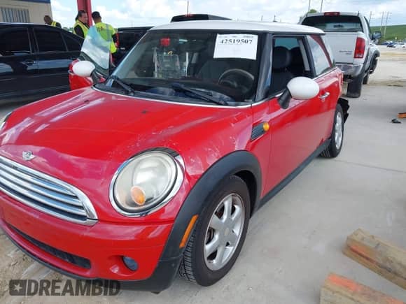 2010 MINI Hardtop with VIN WMWMF3C59ATZ66935, listed as a IAAI auction lot 42519507 with 132,334 mi miles and . Bid and sale history available at DreamBid. Image 2.