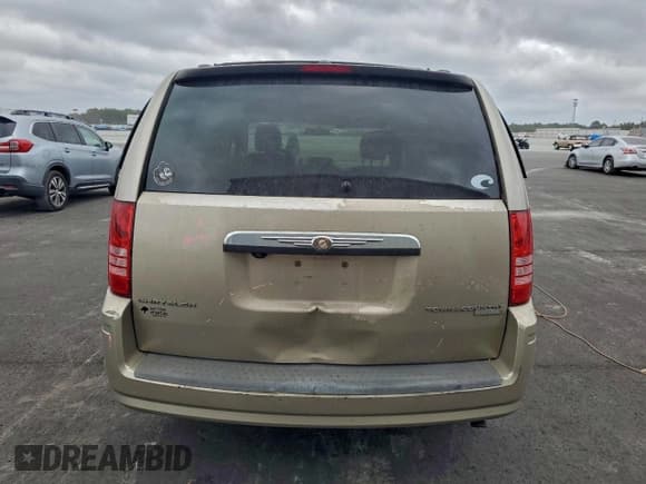 ✅ 2009 Chrysler Town & Country Touring • VIN: 2A8HR54199R632922 • Лот: 94696365. Опубликован ранее на Copart с пробегом Не указан. Бесплатный доступ к архиву аукционных продаж из США и подробный отчёт об истории автомобиля на DreamBid. Изображение 6.