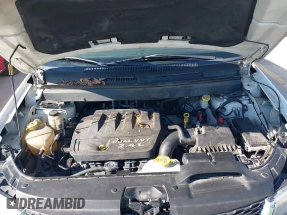 2015 Dodge Journey American Value z VIN 3C4PDCAB0FT540285, wystawiony jako IAAI lot #43610721 z przebiegiem 208 916 mil mil oraz . Historia ofert i sprzedaży dostępna na DreamBid. Obrazek 10.