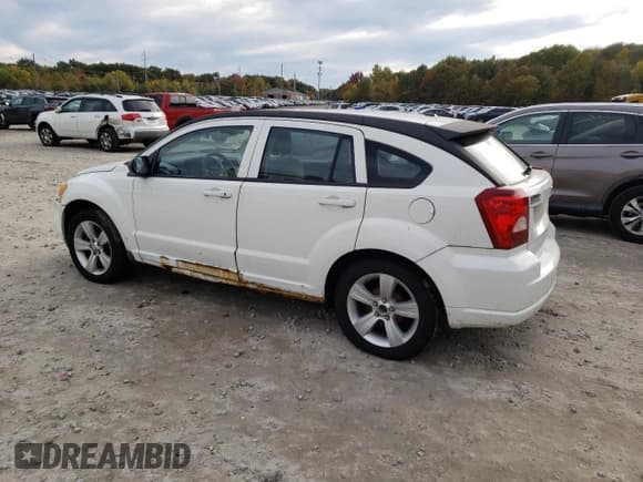 ✅ 2010 Dodge Caliber Mainstreet • VIN: 1B3CB3HA9AD616636 • Лот: 76910894. Опубликован ранее на Copart с пробегом 80 968 миль. Бесплатный доступ к архиву аукционных продаж из США и подробный отчёт об истории автомобиля на DreamBid. Изображение 2.