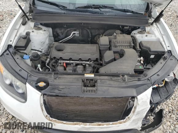 ✅ 2012 Hyundai Santa Fe GLS • VIN: 5XYZGDAB2CG151401 • Lot: 72714994. Listed on Copart with 123,518 mi. Free auction sales archive from the USA and detailed vehicle history report at DreamBid. Image 12.