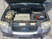 ✅ 2007 Ford Escape Hybrid • VIN: 1FMCU49H07KB60889 • Lot: 71118925. Wystawiony na Copart z przebiegiem 99 990 mil. Bezpłatny archiwum sprzedaży aukcyjnych z USA i szczegółowy raport historii pojazdu na DreamBid. Zdjęcie 12.