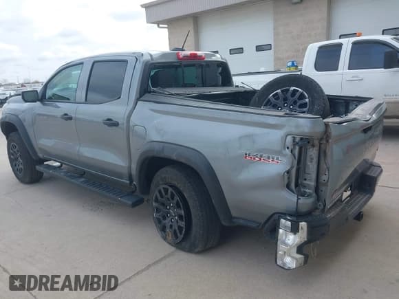 ✅ 2023 Chevrolet Colorado 4WD Trail Boss • VIN: 1GCPTEEK6P1260646 • Лот: 43648543. Опубликован ранее на IAAI с пробегом 48 519 миль. Бесплатный доступ к архиву аукционных продаж из США и подробный отчёт об истории автомобиля на DreamBid. Изображение 3.
