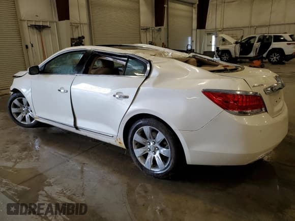 ✅ 2013 Buick LaCrosse Leather • VIN: 1G4GC5E31DF201054 • Lot: 61153685. Wystawiony na Copart z przebiegiem 141 478 mil. Bezpłatny archiwum sprzedaży aukcyjnych z USA i szczegółowy raport historii pojazdu na DreamBid. Zdjęcie 2.