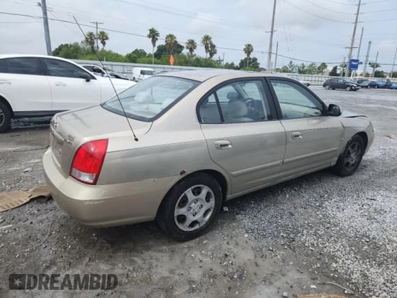 ✅ 2003 Hyundai Elantra GLS • VIN: KMHDN45D83U597221 • Lot: 59762445. Wystawiony na Copart z przebiegiem 114 552 mil. Bezpłatny archiwum sprzedaży aukcyjnych z USA i szczegółowy raport historii pojazdu na DreamBid. Zdjęcie 3.