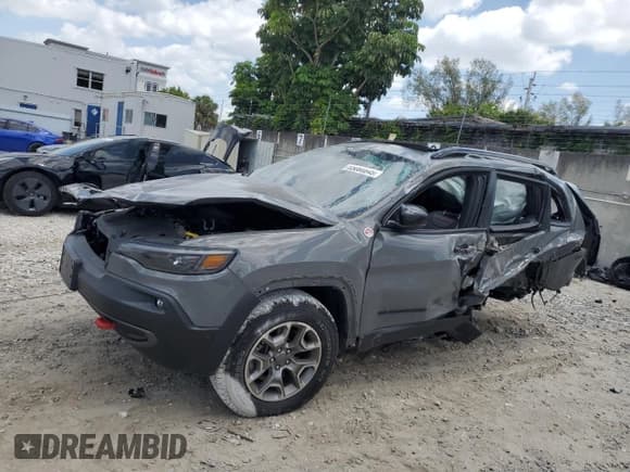 ✅ 2023 Jeep Cherokee Trailhawk • VIN: 1C4PJMBN7PD116214 • Lot: 55080845. Listed on Copart with 14,611 mi. Free auction sales archive from the USA and detailed vehicle history report at DreamBid. Image 1.