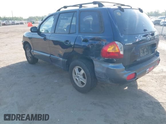 ✅ 2004 Hyundai Santa Fe GLS • VIN: KM8SC73D84U841923 • Lot: 42182384. Listed on IAAI with 121,287 mi. Free auction sales archive from the USA and detailed vehicle history report at DreamBid. Image 3.