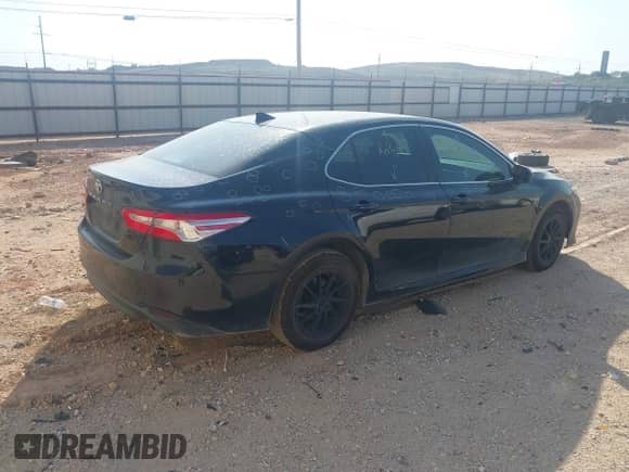 2019 Toyota Camry LE z VIN 4T1B11HK9KU725556, wystawiony jako IAAI lot #42922588 z przebiegiem 138 969 mil mil oraz . Historia ofert i sprzedaży dostępna na DreamBid. Obrazek 4.