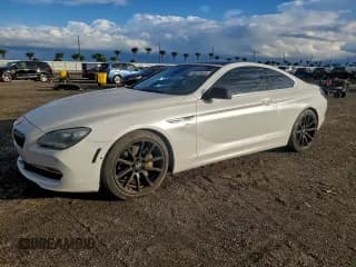 ✅ 2012 BMW 6 Series 650i xDrive • VIN: WBALX5C59CC894531 • Лот: 94411845. Опубликован ранее на Copart с пробегом 137 298 миль. Бесплатный доступ к архиву аукционных продаж из США и подробный отчёт об истории автомобиля на DreamBid. Изображение 1.