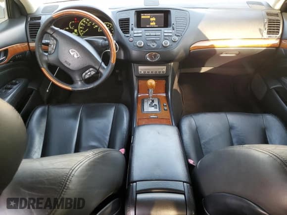 ✅ 2004 Infiniti Q45 • VIN: JNKBF01AX4M500744 • Лот: 85590215. Опубликован ранее на Copart с пробегом 148 689 миль. Бесплатный доступ к архиву аукционных продаж из США и подробный отчёт об истории автомобиля на DreamBid. Изображение 8.