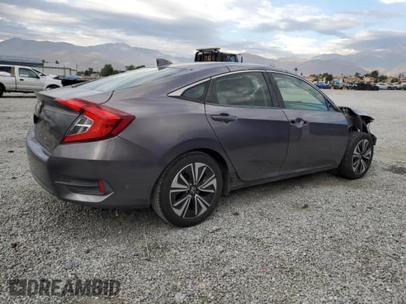 ✅ 2018 Honda Civic EX-T • VIN: JHMFC1F39JX028475 • Лот: 86174585. Опубликован ранее на Copart с пробегом 264 308 миль. Бесплатный доступ к архиву аукционных продаж из США и подробный отчёт об истории автомобиля на DreamBid. Изображение 3.