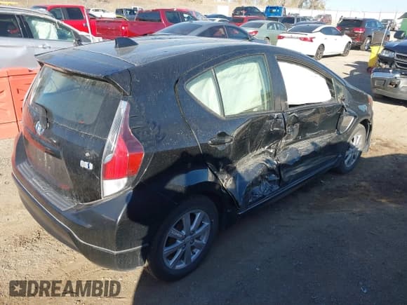 ✅ 2017 Toyota Prius One • VIN: JTDKDTB38H1590914 • Lot: 40650378. Listed on IAAI with 94,262 mi. Free auction sales archive from the USA and detailed vehicle history report at DreamBid. Image 4.