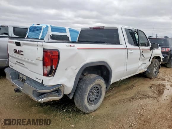 ✅ 2021 GMC Sierra 1500 SLE • VIN: 1GTR9BEDXMZ415428 • Лот: 53950975. Опубликован ранее на Copart с пробегом 218 710 миль. Бесплатный доступ к архиву аукционных продаж из США и подробный отчёт об истории автомобиля на DreamBid. Изображение 3.