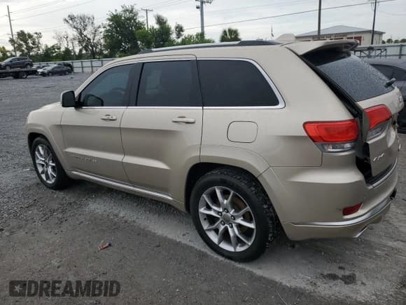 ✅ 2015 Jeep Grand Cherokee Summit • VIN: 1C4RJFJG1FC832070 • Lot: 71791905. Listed on Copart with 129,895 mi. Free auction sales archive from the USA and detailed vehicle history report at DreamBid. Image 2.