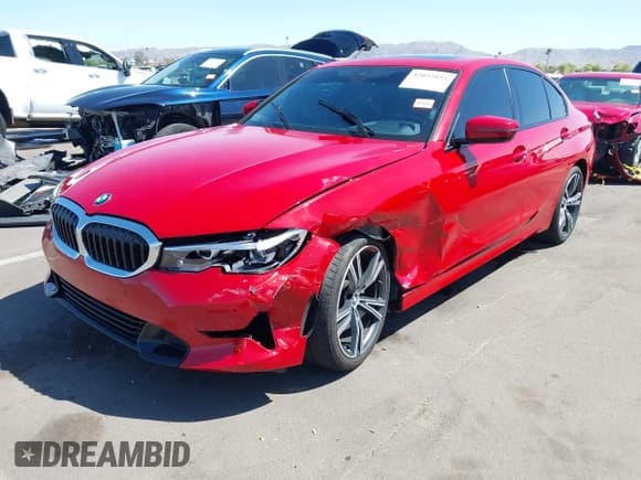 ✅ 2022 BMW 3 Series 330i • VIN: 3MW5R1J09N8C52274 • Лот: 42052851. Опубликован ранее на IAAI с пробегом 30 897 миль. Бесплатный доступ к архиву аукционных продаж из США и подробный отчёт об истории автомобиля на DreamBid. Изображение 2.