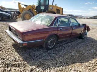 ✅ 1988 Jaguar XJ • VIN: SAJHV1647JC550298 • Лот: 57750035. Опубликован ранее на Copart с пробегом Не указан. Бесплатный доступ к архиву аукционных продаж из США и подробный отчёт об истории автомобиля на DreamBid. Изображение 3.