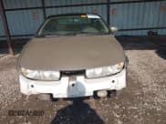 ✅ 1997 Saturn 2dr Coupe • VIN: 1G8ZH127XVZ333643 • Лот: 42463504. Опубликован ранее на IAAI с пробегом 104 295 миль. Бесплатный доступ к архиву аукционных продаж из США и подробный отчёт об истории автомобиля на DreamBid. Изображение 12.