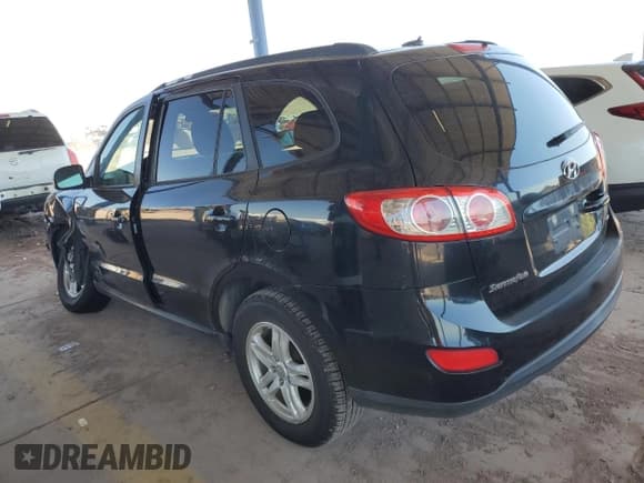 ✅ 2012 Hyundai Santa Fe GLS • VIN: 5XYZGDAB4CG155854 • Lot: 70053684. Listed on Copart with 251,318 mi. Free auction sales archive from the USA and detailed vehicle history report at DreamBid. Image 2.
