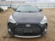 ✅ 2013 Hyundai Veloster Turbo • VIN: KMHTC6AE9DU129043 • Lot: 76062554. Wystawiony na Copart z przebiegiem 103 708 mil. Bezpłatny archiwum sprzedaży aukcyjnych z USA i szczegółowy raport historii pojazdu na DreamBid. Zdjęcie 5.