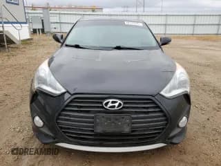 ✅ 2013 Hyundai Veloster Turbo • VIN: KMHTC6AE9DU129043 • Lot: 76062554. Wystawiony na Copart z przebiegiem 103 708 mil. Bezpłatny archiwum sprzedaży aukcyjnych z USA i szczegółowy raport historii pojazdu na DreamBid. Zdjęcie 5.