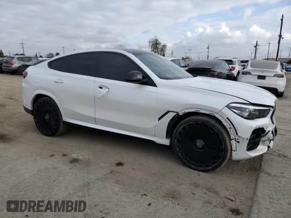 ✅ 2022 BMW X6 M50i • VIN: 5UXCY8C0XN9M57786 • Lot: 54755315. Listed on Copart with 61,065 mi. Free auction sales archive from the USA and detailed vehicle history report at DreamBid. Image 4.