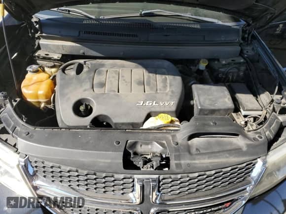 2012 Dodge Journey SXT с VIN 3C4PDCBG4CT289938, выставлен на аукционе Copart как лот 82733135 с пробегом 157 760 миль миль и Списание • Salvage title. История ставок и продаж доступна на DreamBid. Изображение 11.