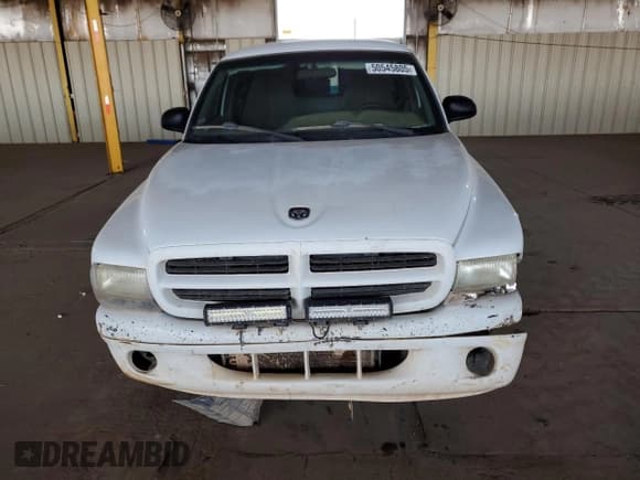 ✅ 1998 Dodge Dakota SLT • VIN: 1B7GL22X1WS652280 • Lot: 50545805. Wystawiony na Copart z przebiegiem Nie podano. Bezpłatny archiwum sprzedaży aukcyjnych z USA i szczegółowy raport historii pojazdu na DreamBid. Zdjęcie 5.