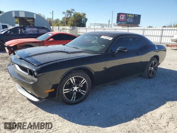 ✅ 2012 Dodge Challenger SXT • VIN: 2C3CDYAGXCH259594 • Lot: 77421654. Wystawiony na Copart z przebiegiem 126 271 mil. Bezpłatny archiwum sprzedaży aukcyjnych z USA i szczegółowy raport historii pojazdu na DreamBid. Zdjęcie 1.