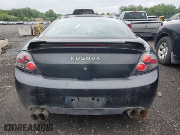 2008 Hyundai Tiburon GS с VIN KMHHM66D08U266025, выставлен на аукционе Copart как лот 59875935 с пробегом 161 271 миль миль и Списание • Salvage title. История ставок и продаж доступна на DreamBid. Изображение 6.