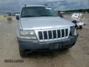 ✅ 2004 Jeep Grand Cherokee Laredo • VIN: 1J4GW48S64C140353 • Lot: 59335125. Listed on Copart with 131,847 mi. Free auction sales archive from the USA and detailed vehicle history report at DreamBid. Image 14.